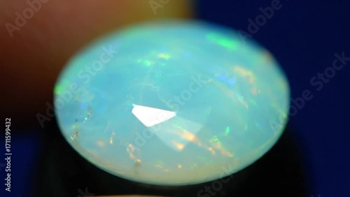 Wallpaper Mural Luminous faceted opal gemstone with iridescent play of color, a treasure of nature. Torontodigital.ca