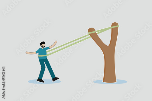 boost career development, The courageous entrepreneur stretches the rubber band in preparation to shoot the slingshot into the air