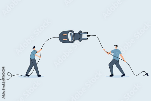Disconnected business, young man and young adult woman pull plug on the Internet