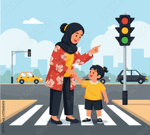 A mother wearing a hijab and her daughter are crossing the street at a pedestrian crossing, guided by a traffic light.