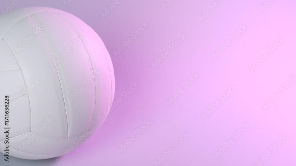 Obraz premium White volleyball ball on light background. Space for text