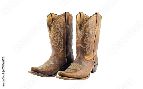 Pair of distressed brown leather cowboy boots isolated on transparent background