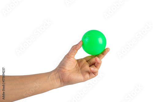 Green plastic ball in hand, transparent background