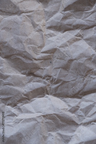 Brown crumpled recycled paper texture background. Kraft Paper