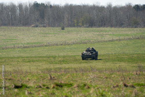 British army Warrior FV510 IFV tank in action on a battle exercise
