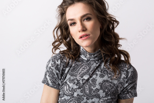 Portrait of a beautiful desirable woman close-up on a white background