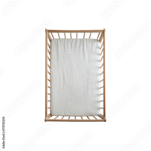 Top View of Empty Wooden Crib with White Fitted Sheet