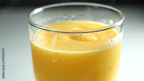 Wallpaper Mural Pouring Fresh Orange Juice into a Glass for a Healthy Drink. Torontodigital.ca