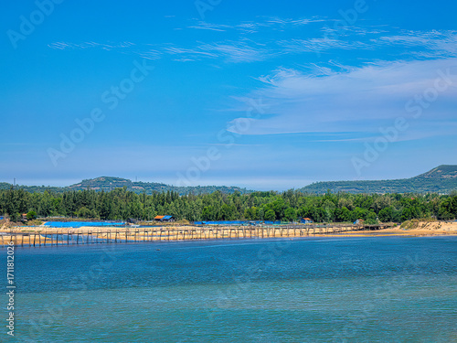 Ong Cop (Mr. Tiger) wooden bridge across Phu Ngan river in Song Cau, Phu Yen - one of the longest wooden bridges in central Vietnam - can be a shortcut to the famous Ganh Da Dia scenic spot