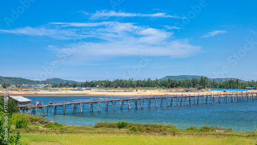 Ong Cop (Mr. Tiger) wooden bridge across Phu Ngan river in Song Cau, Phu Yen - one of the longest wooden bridges in central Vietnam - can be a shortcut to the famous Ganh Da Dia scenic spot
