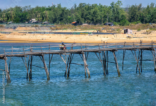 Ong Cop (Mr. Tiger) wooden bridge across Phu Ngan river in Song Cau, Phu Yen - one of the longest wooden bridges in central Vietnam - can be a shortcut to the famous Ganh Da Dia scenic spot