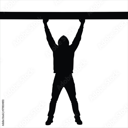 Silhouette of a Man Lifting a Heavy Beam