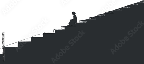 A silhouette of a person sitting on stairs, evoking feelings of solitude and contemplation.