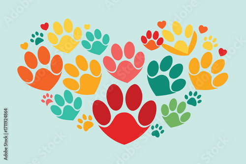 Heart shape made of colorful paw prints on a light blue background