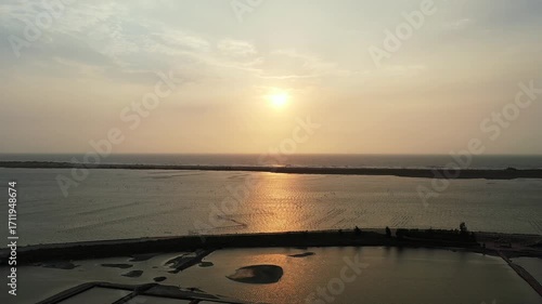 Sunset Reflections over Salt Fields in Taiwan