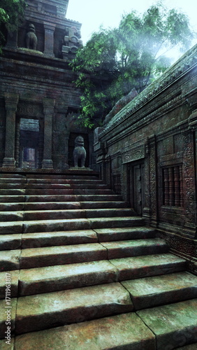 A set of stone steps leads up to the entrance of an old temple in the Cambodian jungle.