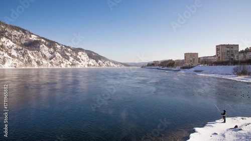 Time lapse clouds in the sunset sky moving background of the Yenisei River in the city of Krasnoyarsk, Siberia, Russia