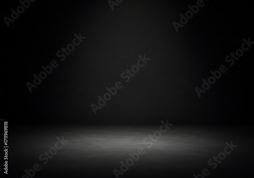 Dark empty studio room with spotlight on concrete floor, abstract black background for product display.