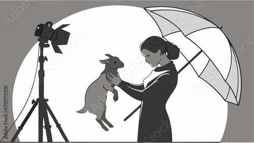 Studio photoshoot of a young goat with a person and lighting equipment.