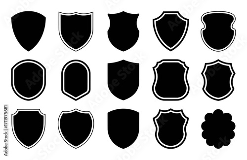 Collection of Black Shield and Badge Shapes on White Background