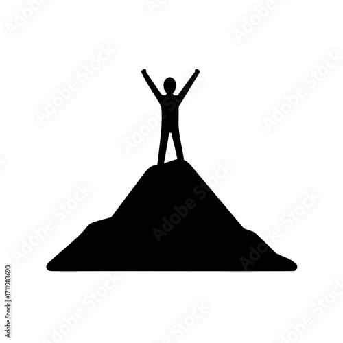 Silhouette of a person standing victoriously on top of a mountain peak