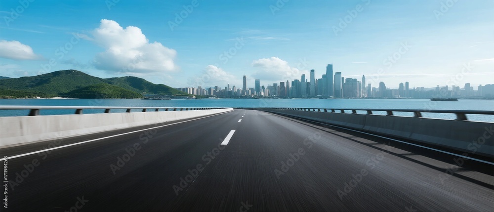 Obraz premium Smooth highway leading to modern city skyline under clear blue sky