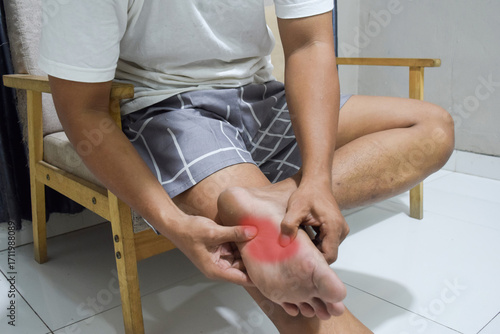 young man feet pain and foot injury, healthcare concept