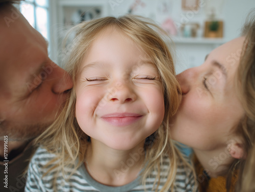 Happy girl with blond hair smiles between parents, showcasing love and joy. warm atmosphere captures beautiful family moment filled with affection
