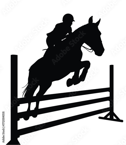 Silhouette of a horse and rider jumping over a fence
