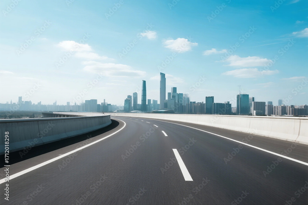 Fototapeta premium Smooth highway leading to modern city skyline under clear blue sky