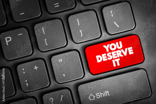 Obraz na plátně You Deserve It text button on keyboard, concept background