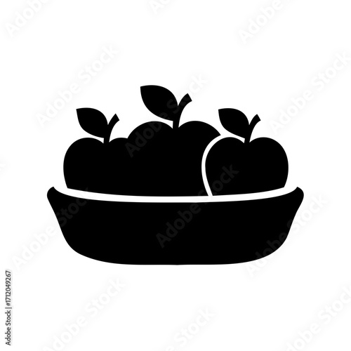 Black and white image showcasing a bowl filled with delicious looking apples