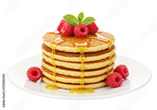 Isolated pancakes stack with raspberries and honey on a plate ready to eat for breakfast