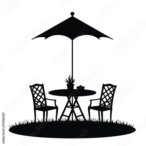 Black silhouette of outdoor patio table chairs and umbrella