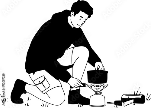 Man kneeling to set up camping stove
