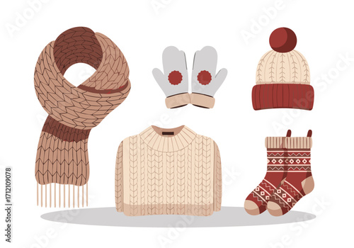 An illustrated set of cozy and warm winter clothing essentials like a sweater, scarf, and hat