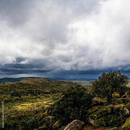 Panoramic view of mountain peaks with clouds on top of the Salamanca mountains.