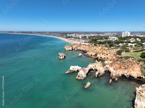 Cliffs of the Algarve between Portimao and Alvor, beautiful bays and beaches on the Atlantic Ocean