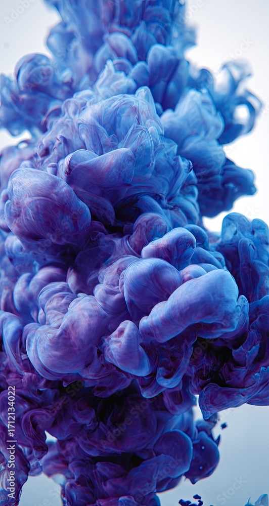 Fototapeta premium Indigo ink clouds swirling in water
