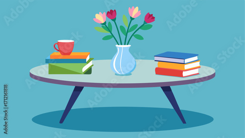 A sleek chrome coffee table adorned with books and a vibrant vase of fresh flowers.