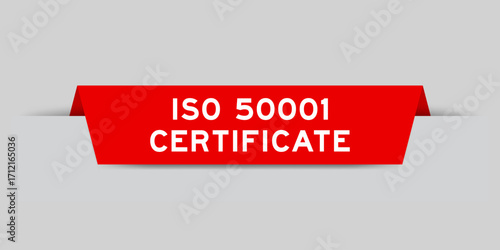 Red color inserted label with word ISO 50001 certificate on gray background