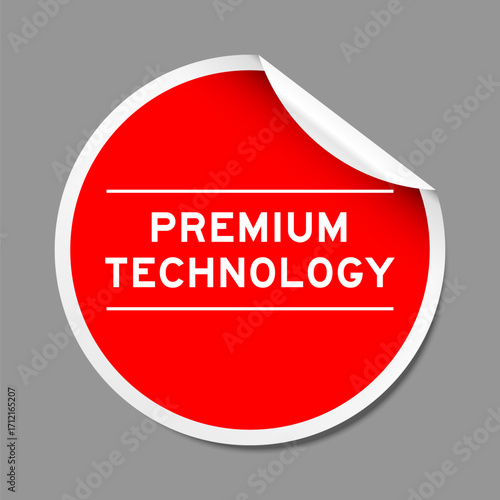 Red color peel sticker label with word premium technology on gray background