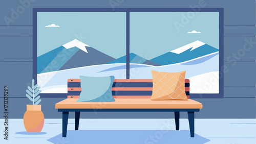 A cushioned bench in front of a large picture window overlooking a snowy landscape outside adorned with a few woven pillows and a blanket for added warmth.