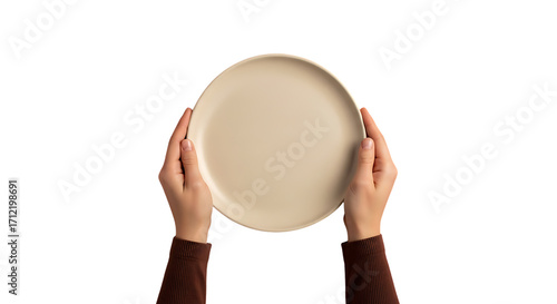 Hands elegantly present a clean beige plate, ready for culinary creations or stylish display