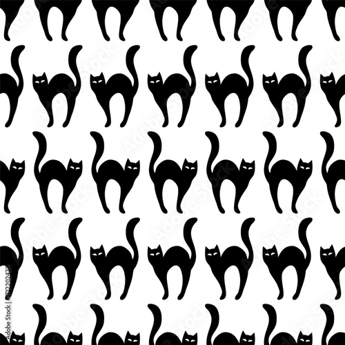 Black cats silhouettes. Seamless pattern on transparent background, vector.