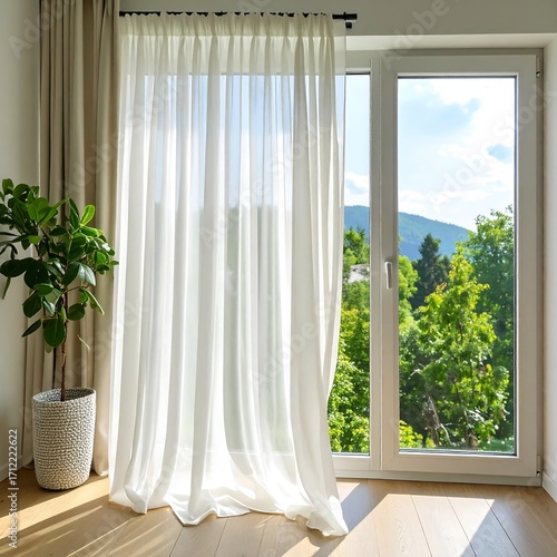 Light, airy room with sheer curtains and a view