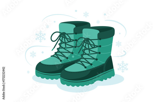 Pair of teal winter snow boots with laces and thick soles