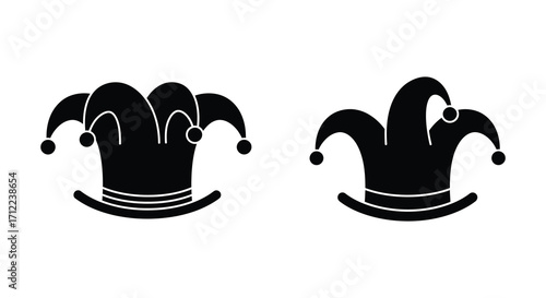 Two black and white jester hats with bells are displayed