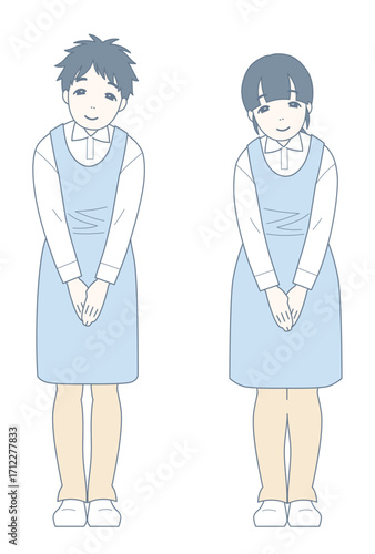 軽くお辞儀をしながら微笑む介護士