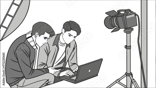 Two colleagues reviewing footage on a laptop during a film shoot.